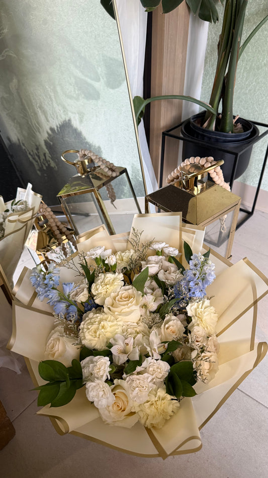 Elegant yellow and blue floral arrangement for gifting in Canada GTA