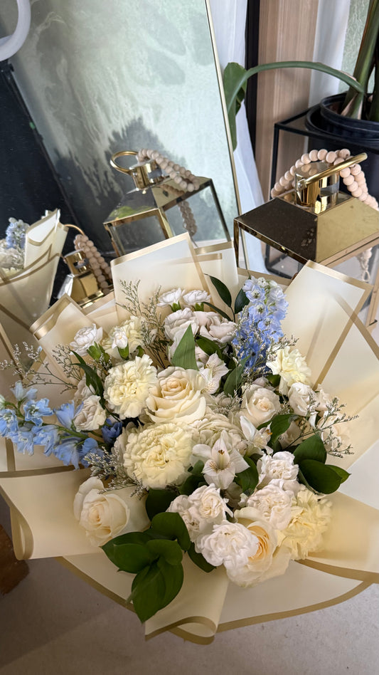 Butter Yellows and Blues flower bouquet with fresh yellow and blue blooms
