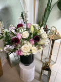 The Atelier black vessel floral arrangement from another angle