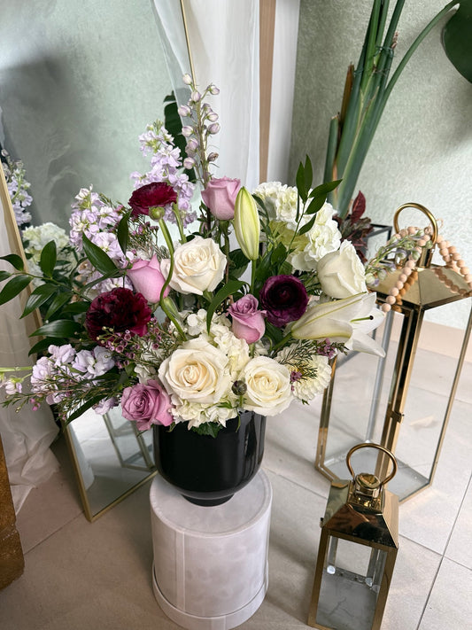 The Atelier black vessel floral arrangement from another angle