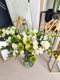 Alternate view of the white and green vase arrangement