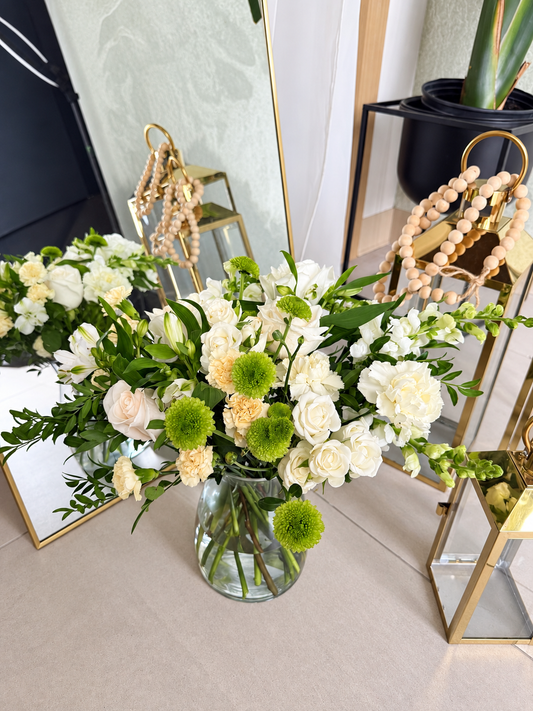 Alternate view of the white and green vase arrangement